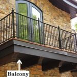 Balcony : A platform enclosed by a wall or balustrade on the outside of a building, with access from an upper-floor window or door.