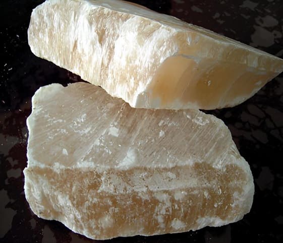 Alabaster Two pieces of alabaster white soap stacked neatly on top of each other.