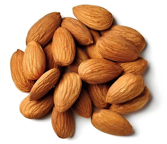 Almond A handful of almonds displayed on a wooden surface.