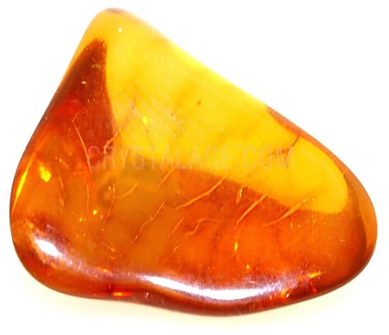 Amber A sizable amber stone featuring a striking combination of yellow and brown colours.