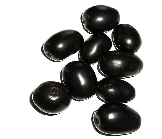 A cluster of blackberries arranged neatly on a clean white surface.