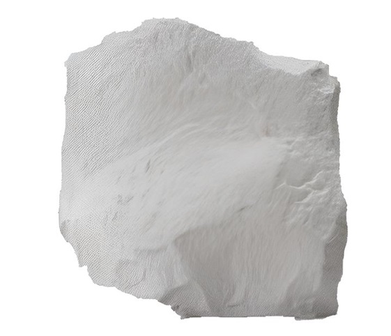Chalk / Limestone A small piece of white chalk or limestone on a white background.