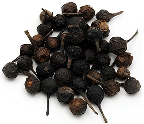 Cubeb A close-up view of a pile of cubeb grains on a clean white background.