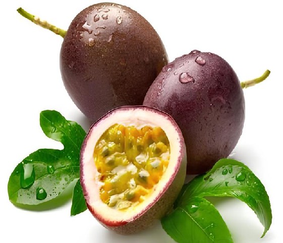 Passion fruits surrounded by green leaves.