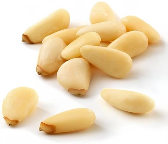 Pine nut Close-up of pine nuts on a white background.