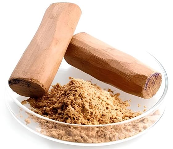 Sandal A bowl containing two sticks of sandal with its powder.