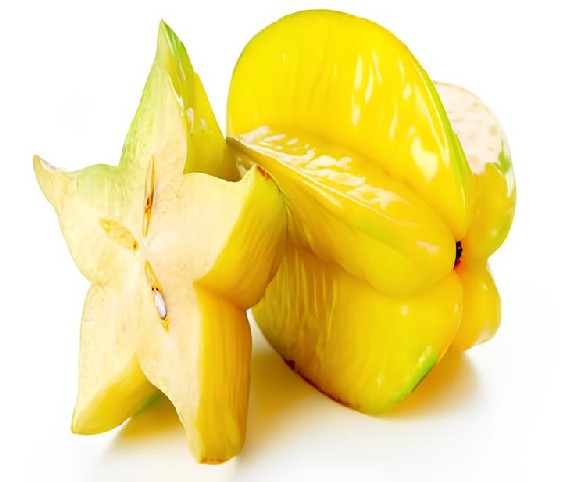 A fresh star fruit with a slice of it, displayed on a clean white background.