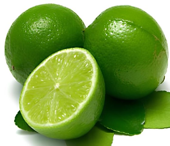 Lime Two and a half limes stacked on each other with its green leaves.