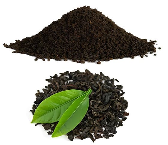 Tea Leaves A photo featuring black tea and green tea leaves isolated against a clean white background.